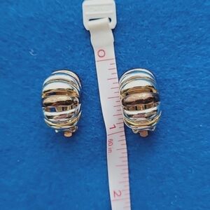 Silver, gold, and bronze clip-on earrings